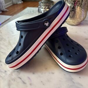 CROCS Adults Navy Water Shoes with Red and White Trim 
W10 M8
